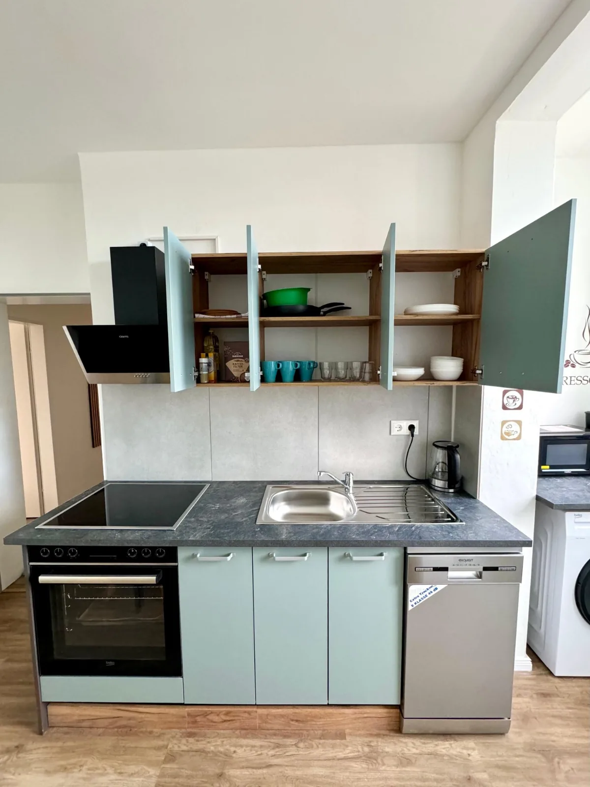 Voll ausgestattete Küche im horizonte Apartment